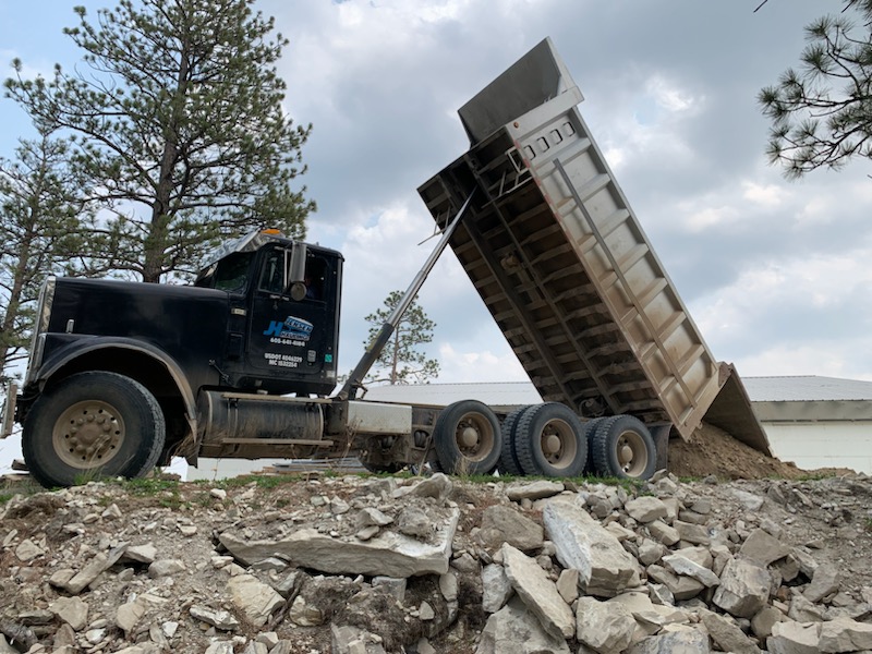 Jensen Hauling, LLC truck dumping